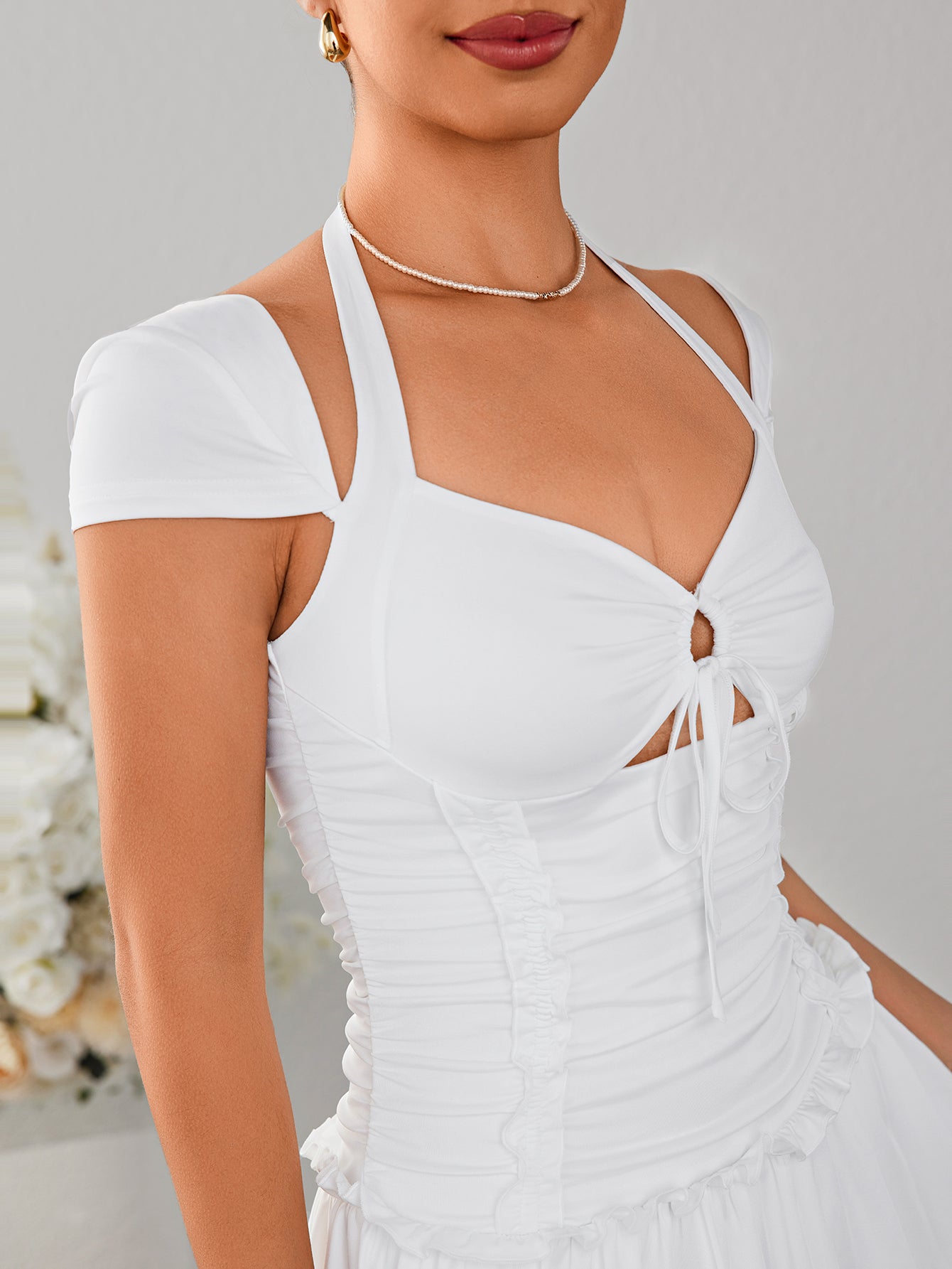 ruched halter cut out mini dress#color_white